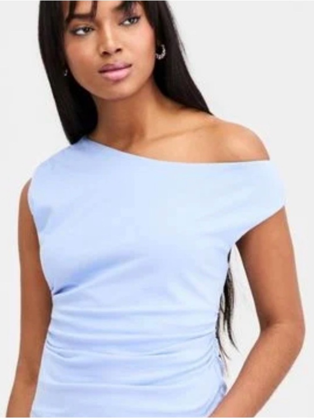 A wide boat neckline lets you wear this super versatile top from Bar III off on